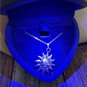 14k Sun Burst Pendant , with 14k 18” chain . The pendant is 3/4” long